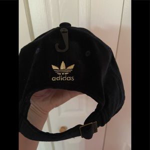 Adidas origins dark navy blue with gold logo